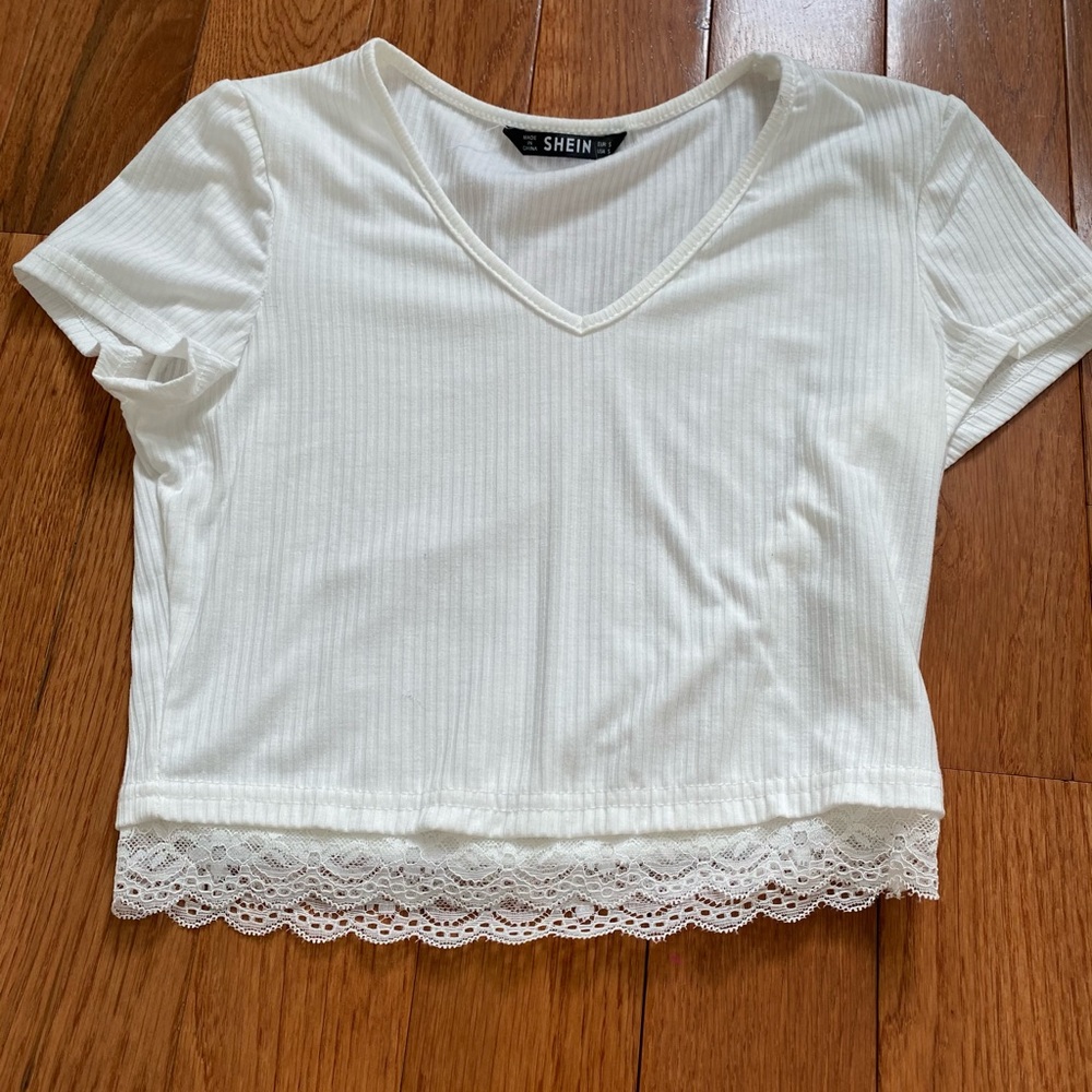 White tee with lace design